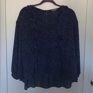 Blue and white polka dot blouse